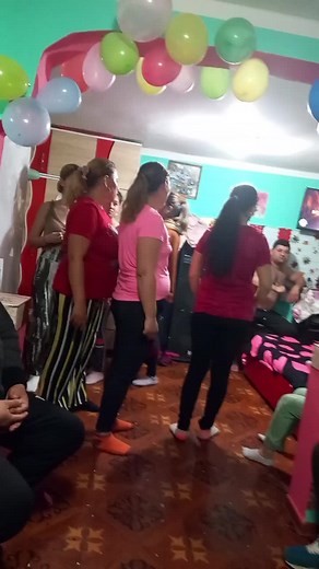 Festive Indoor Dance Party with Colorful Balloons