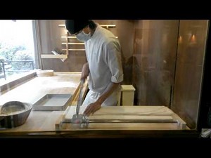 Professional chef making Japanese Teuchi udon noodles