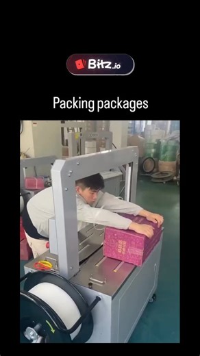 Inflyta on Instagram: "The Instagram reel showcases a 12-second video of an industrial stretch wrapping machine efficiently securing pink boxes with plastic film, demonstrating seamless automation in a factory setting. Shared by Tansu Yegen, a prominent AI and economy commentator, it forms part of his viral series on practical innovations, amassing over 1.3 million views and 500 likes within 24 hours. Automated packaging systems like this enhance manufacturing efficiency by increasing speed, red