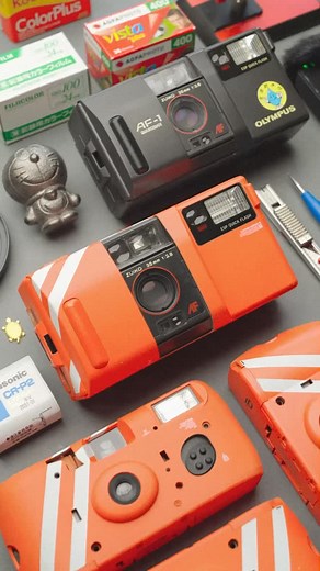 David C W | Customized Olympus AF-1 vs the original 🔧📷 From a plain black body to a bold flight recorder design, the transformation is complete. Side... | Instagram
