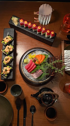 Her Cafe Story by Jujujucloe on Instagram: "Perched high above the city, @sushisambasingapore feels like dinner with a view — skyline on one side, sea on the other, and plates that keep the table buzzing. It’s bold, playful, and meant for sharing: fresh sashimi, crispy bites, comforting mains, and rolls that disappear a little too fast. Come for the food, stay for the energy — especially when the sun dips and the night slowly turns electric 🌃🍣 What we ordered: • Salmon Tartare • Crispy Octopus