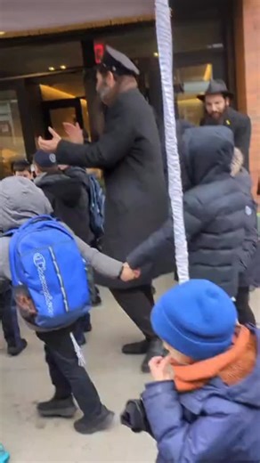 Children from Lubavitch Yeshiva in Crown Heights were greeted with a dance under a chuppah on Thursday in celebration of the day of the Rebbe and Rebbetzin’s wedding on 14 Kislev | COLlive News