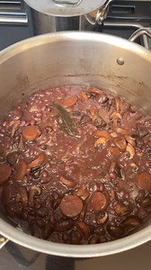 This tastes amazing! I bean-ized Julia Child’s classic boeuf bourguignon by swapping out the boeuf for black beans. While the beans cooked in red wine and the bean soaking water, I braised onions and browned mushrooms. Once the beans were tender, I combined everything. Yum! | Zero-Waste Chef
