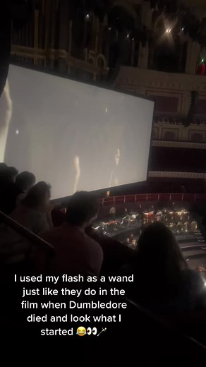 Funny Reaction to Flash 'Wand' at Orchestra Performance of Harry Potter