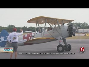 World War II Veteran Takes Dream Flight Aboard Restored Boeing Biplane