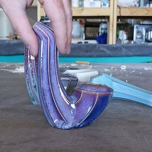 Greg strikes again! Used a tile saw to slice this Hammerly Ceramics pipe in half for your viewing pleasure. They are glazed inside and out. The high fire porcelain is strong, durable, can be cleaned just like any glass pipe, and I've been told they "hit like saxophone. In a good way" 🤣 | Hammerly Ceramics