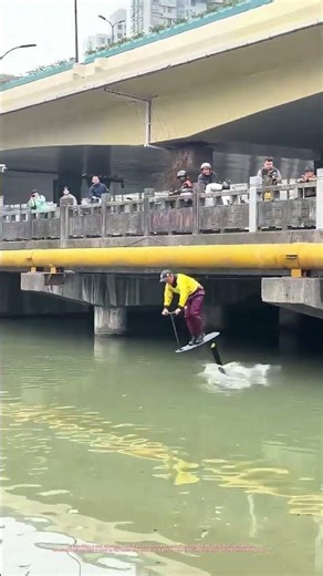 Hydrofoil Bridge Jump | Man attempts a daring river launch and crashes straight into the water
