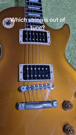 Identifying the Out-of-Tune Guitar String