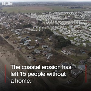 Demolition work begins on the seafront homes falling on to the beach below. | BBC Norfolk