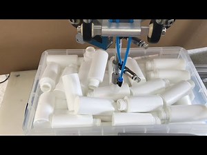 Bin picking plastic bottles with a delta robot