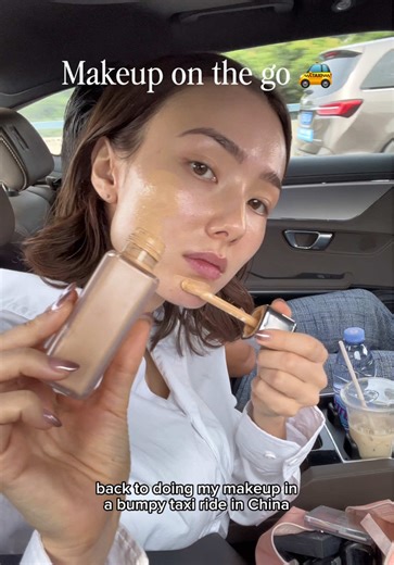 doing makeup in a bumpy taxi ride in China 🚕 #fyp #makeupintaxi #makeuponthego #chinatrip #makeuproutine