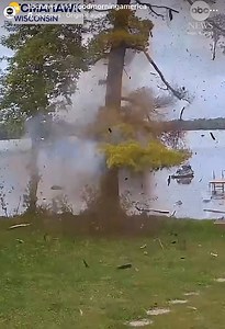 84K views · 246 reactions | Security camera footage shows a Wisconsin man using lake water to put out a fire on his property after a tree was struck by lightning, setting it ablaze. : ABC News | Trooper Bob - ABC News 4 Traffic Tracker | Facebook