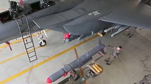 The Republic of Korea Air Force (ROKAF) version of the F-15E Strike Eagle, the F-15K Slam Eagle, has been capable of launching and controlling the SLAM-ER since 2006 in test exercises. The AGM-84H/K SLAM-ER (Standoff Land Attack Missile-Expanded Response) is a precision-guided, air-launched cruise missile produced by Boeing Defense, Space & Security for the United States Armed Forces and their allies. The SLAM-ER is capable of attacking land and sea targets at medium-to-long-ranges (155 nautical