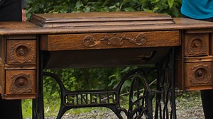 Appraisal: Singer Oak-cased Sewing Machine & Table, ca. 1900 | Antiques Roadshow