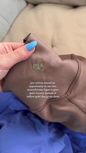 I LOVE the TNA Athleisure Collections but LOATHE the New Logo Colour