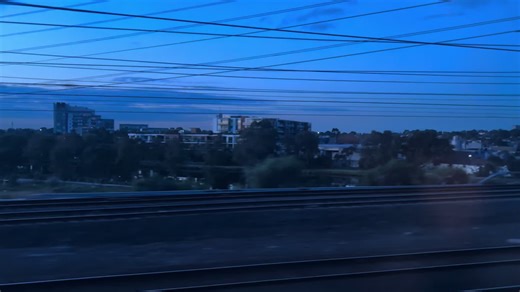 Train Journey Through Urban Landscapes