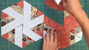 60K views · 1.1K reactions | This is a tutorial for to make a hexagon quilt blocks made out of 6 equilateral triangles. This is an easy quilt block. Check the full details below: Blog post: - https://mypatchwork.wordpress.com/2017/10/01/video-tutorial-3-strip-hexagon-quilt-blocks Full video: - https://youtu.be/-70zP9O3sxU | TeresaDownUnder | Facebook