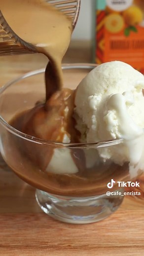 Ready for a scoop of bliss? Simply follow these steps to create our easy, dreamy Café Enrista Marula Affogato! 🍨☕ Café Enrista Marula Affogato Recipe Ingredients: - 1 sachet of Café Enrista Marula Flavoured Cappuccino - 60 ml hot water - 2 scoops vanilla ice cream - Grated chocolate for garnish Instructions: 1. Prepare a 1/4 cup (60 ml) of Café Enrista Marula Flavoured Cappuccino by combining the contents of the sachet with boiling water. Allow to cool. 2. Place 2 scoops of vanilla ice cream in