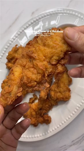 Prema's Cooking Journal on Instagram: "Raising Cane’s Chicken Recipe Ingredients: Chicken breast or tenderloins – 500 g (about 1 lb) (cut into finger-size strips) Buttermilk – 1 cup (240 ml) Salt – 1 tsp Black pepper – 1 tsp Garlic powder – 1 tsp Onion powder – 1 tsp Chilli powder – ½ tsp Instructions: 1. In a bowl, mix buttermilk with salt, pepper, garlic powder, onion powder, and chilli powder. 2. Add chicken strips and coat well. 3. Marinate for at least 2 hours (overnight for best flavour).