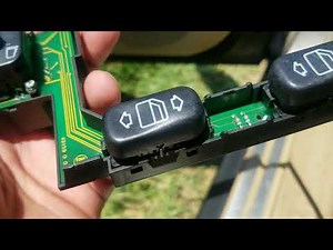 How do you replace the power window button of the Mercedes C-Class?