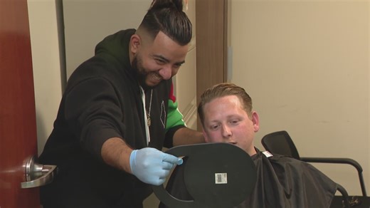 Barber offers free haircuts to unhoused men, helping them regain confidence