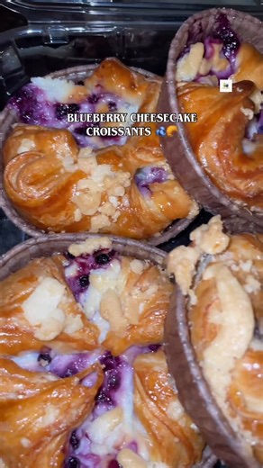 Eatz & Bitez | Recipes & Wellness on Instagram: "Costco really did their big one with these... 🫐🥐 These Blueberry Cheesecake Caramelized Croissants are pure tenderness. That flaky, buttery crunch on the bottom is literal 💎 ✨Pro-tip: Pop them in the air fryer for 1–2 minutes to get that cheesecake filling extra melty! 🤤 #costcofinds #blueberrycheesecakecroissant #cheatmeal #viralfood #costcobakery (TikTok: fayefaye2k)"