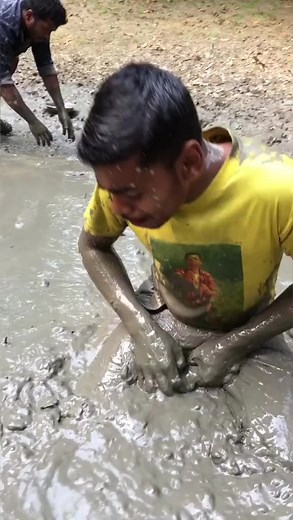 Muddy Fun: Helping Friends in Outdoor Adventure