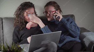 Two friends fighting, arguing and shouting at home