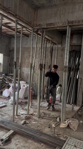 Installing Vertical Rebar at a Construction Site