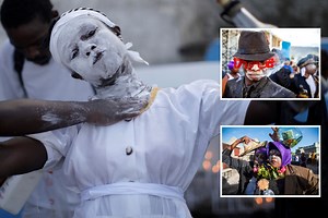 Haitians celebrate Day of the Dead with festival-goers 'possessed by spirits'