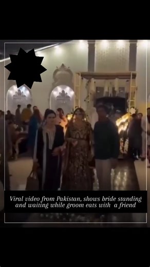 centralbytes on Instagram: "An undated short video from a Pakistani wedding has gone viral on social media, showing a bride standing and waiting while the groom appears busy eating with a friend. The clip has sparked a wave of reactions online, with people divided over what they see. Some viewers criticized the groom’s behavior, calling it “disgusting” and “very scary.” One user wrote, “She should have called it off immediately!” Many shared similar sentiments, expressing concern over what they 