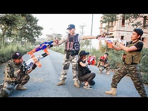 Game Nerf War : Special Police Winter Warriors Nerf Guns | Fight Attack Criminal Group