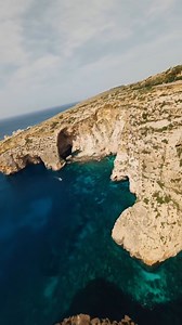 Soaring through Malta’s legendary Blue Grotto ✨ Turquoise waters and sea caves are even more magical from above, don't you agree? 🌊 #VisitMalta #ExploreMore #MoreToExplore #DJI #FPV #VisitEurope #Wanderlust #BeautifulDestinations #Drone #Coast #Cave #Sea #Ocean [ 📸 @pshepfpv ] | Visit Malta