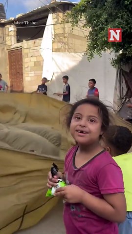 Palestinian Children Find Joy in Playing With Aid Parachute