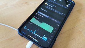 Why does my iPhone buzz or chime when I plug it in to charge?