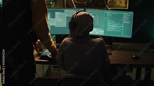Diverse hackers breaking into government system to steal important data and receive ransom, planting trojan virus to crack software. Team of thieves using cryptojacking concept, hacktivism.
