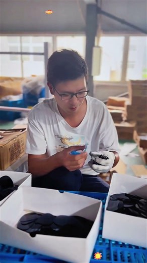The Final Guard: They are carefully removing the film before assembly.