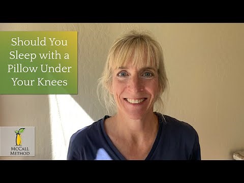 Should you sleep with a pillow under your knees?