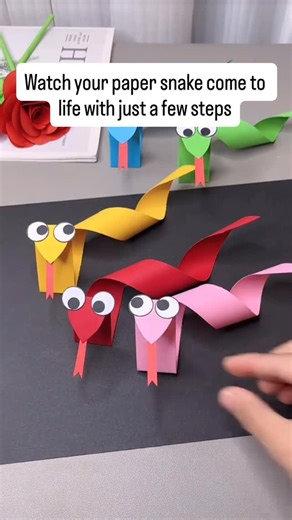 Raising smart and happy kids on Instagram: "These paper snakes are a fun and easy craft that wiggles with every move! Using just strips of paper, kids can fold and glue their way to a colorful slithering friend. It’s a quick project that helps practice fine motor skills, creativity, and patience. Perfect for classrooms, parties, or a cozy craft time at home — make one snake or a whole family of them!"