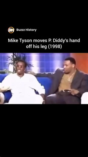 Buzzz History on Instagram: "A 1998 interview clip featuring Mike Tyson and P. Diddy on The Keenen Ivory Wayans Show. The clip that has often resurfaced online is an awkward moment where Mike Tyson appears to move Diddy's hand away from his leg during the interview. • Follow (us) @buzzzhistory for more ⚡ #explore #viral #reels #miketyson #pdiddy #celebrities #meme #awkward"