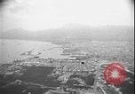 August 16, 1943 – Palermo Italy: Aerial view of Palermo, Sicily harbor covered by mechanized smoke screen of US Army during Invasion of Sicily in WW2