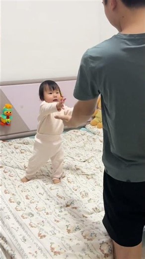 Kids run to dad after shower