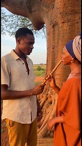 Il aime la musique🪉, et maman l'aide #music #flute #apprendrelamusic #baobab #maman #fypシ゚viralシfypシ゚ #2026Goals #viralreelsシ #village #education | Hge Monde