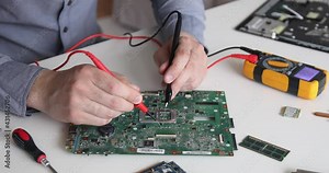 Technician repairing a computer. Work in the service center. Computer repair. Laptop repair. Repair of computer parts. Electronics repair and maintenance service. Electronics and computer technology Stock Video