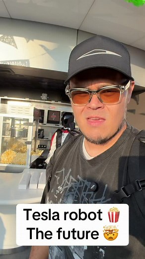 Tesla Optimus gives me popcorn and it’s dressed up as a vampire #fyp #viral #tesla #optimus #teslarobot | Tesla Owners of Silicon Valley