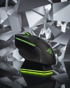 Unleash endless customization with the Razer Basilisk Ultimate—built with 11 programmable buttons, 14 Razer Chroma lighting zones, and a scroll wheel resistance dial, making this mouse the ultimate weapon on the battlefield. | Razer