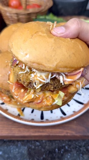 Recipe Racer on Instagram: "Homemade Crispy soya burger 😍🤤 #soyaburger #reels #easy #reelkarofeelkaro #reel #viralvideos #soyaburger #crispyburger #homemade #streetfood #homemadeburger #burgerrecipe #easy #easyrecipe #instaviral #trending #alootikkiburger #viral"