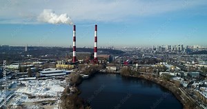 Garbage incineration plant. Waste incinerator plant with smoking smokestack. The problem of environmental pollution by factories