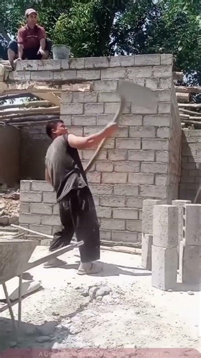 Brick wall construction with perfect teamwork #shorts #construction #masonry
