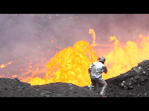 Throwing A Huge Rock Into A Volcano And It EXPLODES